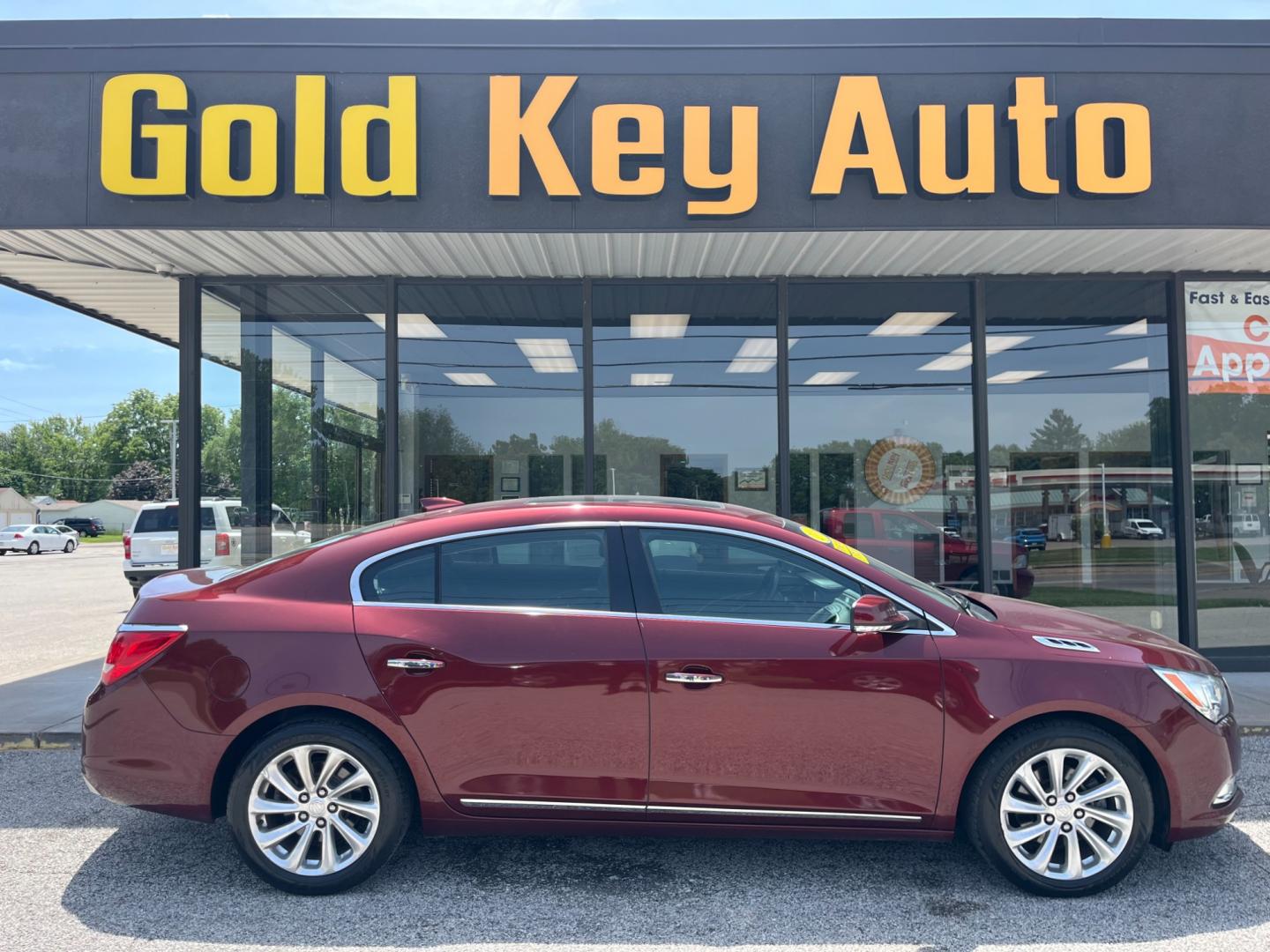 2016 Deep Garnet Metalllic Buick LaCrosse Leather Package (1G4GB5G32GF) with an 3.6L V6 DOHC 24V FFV engine, 6-Speed Automatic transmission, located at 1633 W Kimberly, Davenport, IA, 52806, (563) 323-5341, 41.559456, -90.598732 - Photo#0